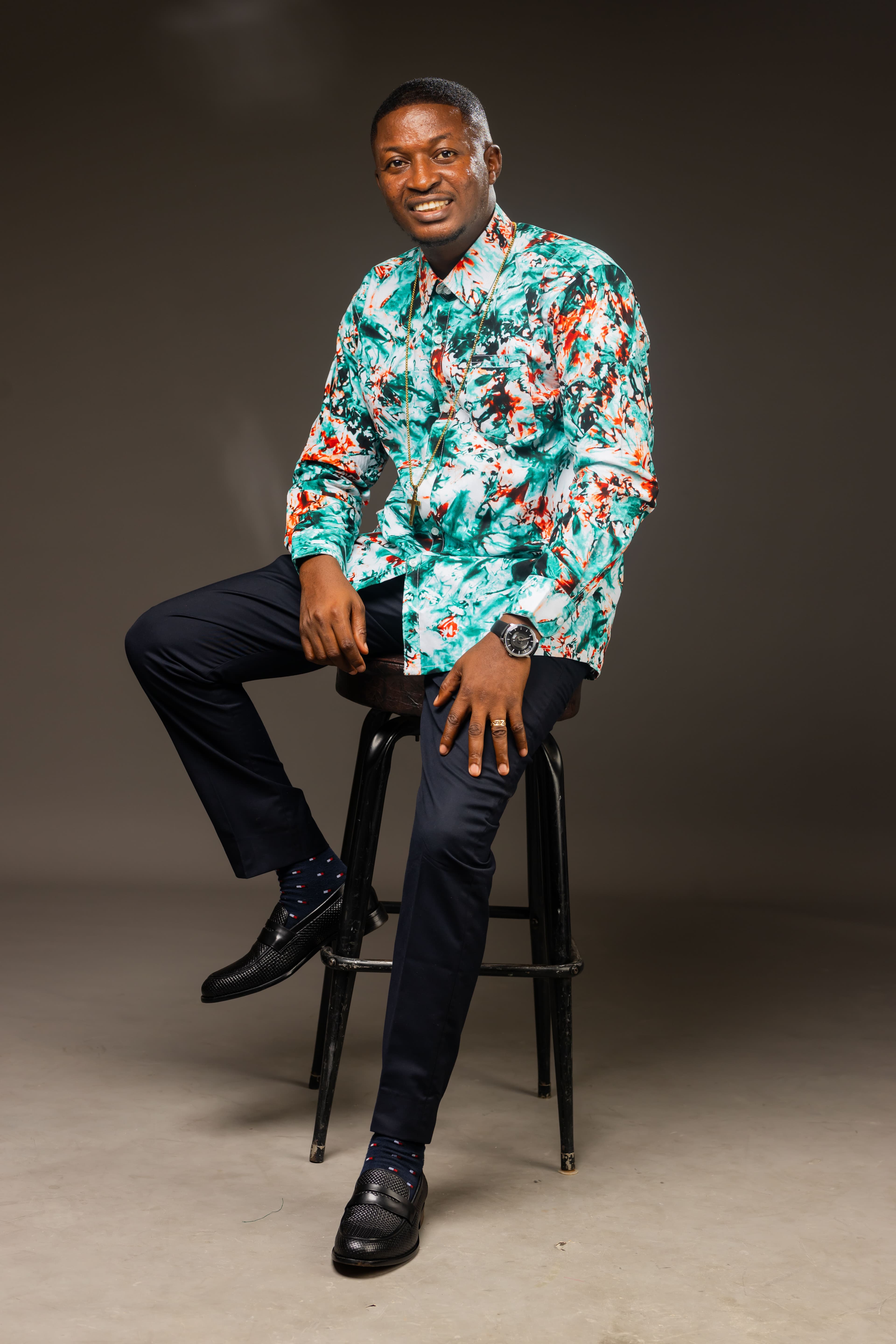 Rev. Theophilus Badger in colorful casual shirt